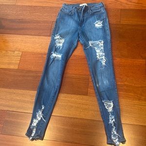 vibrant high waisted ripped jeans size 3 / 25